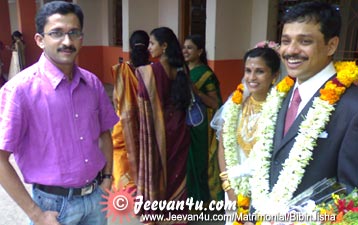 Neju Paul - Bibin Jisha Wedding Photo